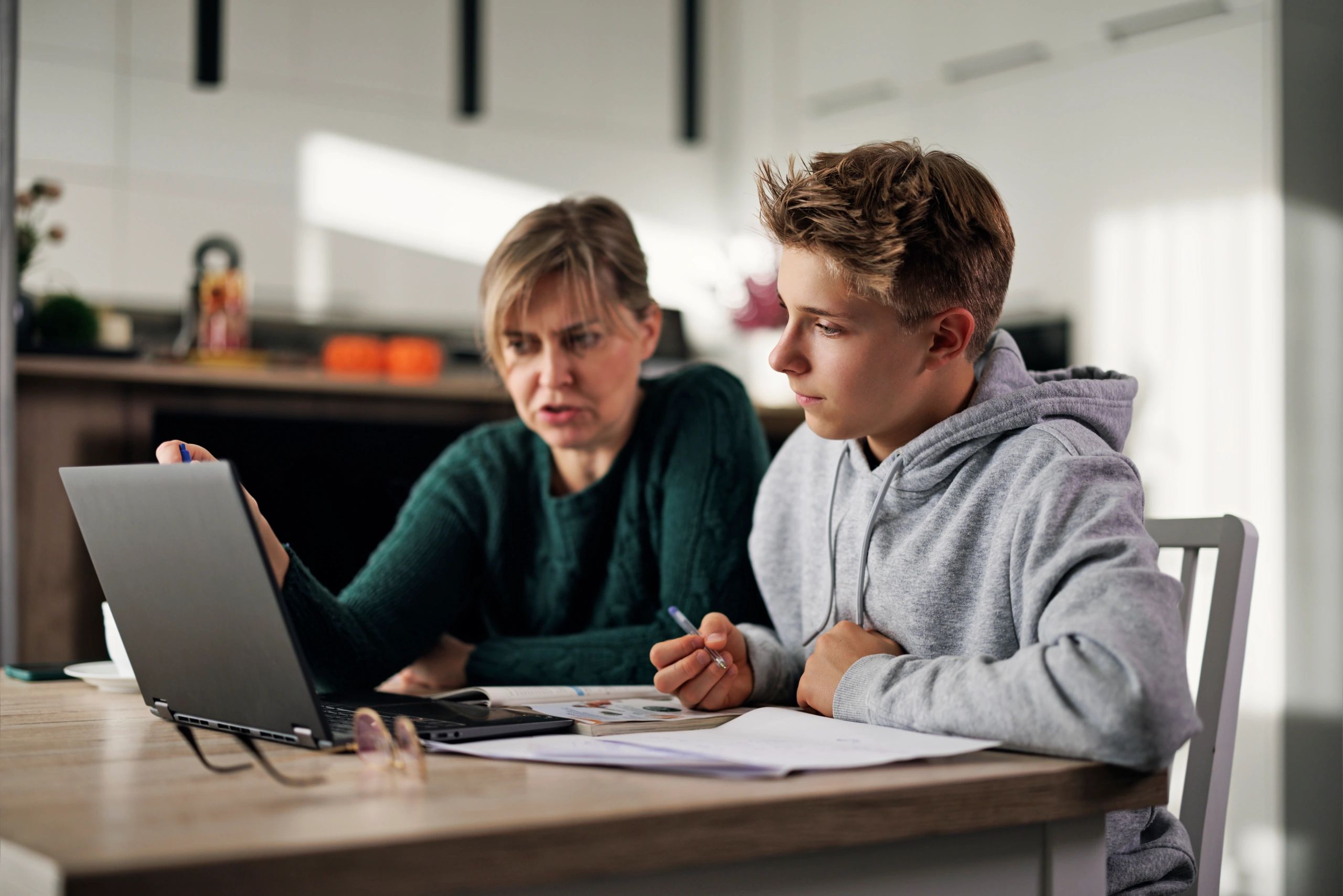 Teen student receiving homework help